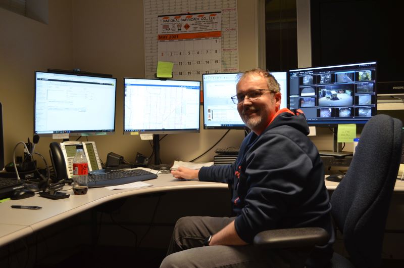 SPU Operations Response Dispatcher Neal Reinig takes a break from answering calls from the public on November 23 at SPU’s North Operations Center off North 128th street.